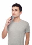 Young Man Shaving Stock Photo