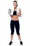 Fitness Woman Holding Sipper Bottle Stock Photo