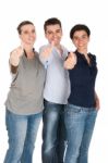 Brother And Sisters Showing Thumbs Up Stock Photo