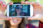 Portrait Of Beautiful Girl Taking A Selfie With Mobile Phone In Stock Photo