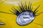 Car Headlight Complete With Eyelashes Stock Photo