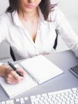 Business Lady Writing On Notebook Stock Photo