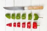 Fresh Cayenne Sweet Peppers Sliced In Pieces Stock Photo