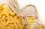 Italian Pasta Penne With Wheat Stock Photo