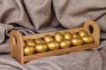 Gold Easter Egg  In Wooden Shelf Stock Photo