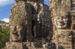 Ancient Stone Face Of Bayon Temple Stock Photo