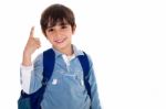 Young School Boy With Finger Up Stock Photo