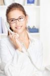 Woman On Land Line Call Stock Photo