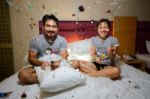 Asian Couple Celebrating New Year With Fire Cracker Stock Photo