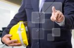 Engineer Touching Button Stock Photo