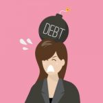 Business Woman With Debt Bomb On Her Head Stock Photo