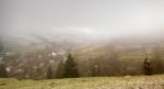 Late Autumn Misty Morning In A Village. First Snow Stock Photo