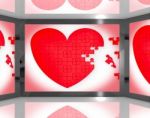 Puzzle Heart On Screen Showing Romantic Movies And Soap Operas Stock Photo