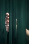 Prisoner In Jail Background Stock Photo