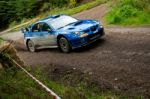 M. Cairns Driving Subaru Impreza Stock Photo