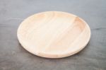 Wooden Plate On Grey Background Stock Photo