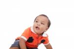 Closeup Of Happy One Year Old Hispanic Baby Boy On Isolated Back Stock Photo