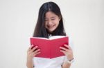 Portrait Of Thai Teen Beautiful Girl Reading Book Stock Photo