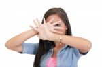 Confident Woman Making Stop Gesture Sing With Hand Stock Photo