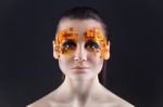 Orange And Red Rhinestones On A Girl Face Stock Photo