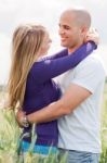 Couple Embracing Outdoors Stock Photo