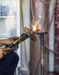 Welders Were Repairing Shock Absorbers Stock Photo