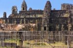 Ruins Of Phnom Bakheng Temple At Angkor Wat Complex Stock Photo