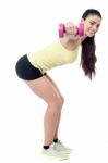 Sporty Woman With Dumbbells Stock Photo