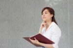 Portrait Of Thai Adult Businesswoman Beautiful Girl Read A Book Stock Photo