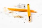 Broken Pencil With Metal Sharpener And Shavings Stock Photo