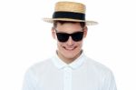 Smiling Young Man Wearing Hat Stock Photo