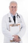 Senior Doctor Holding Clipboard Stock Photo