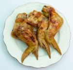 Grilled Wings Chicken  On White Dish Stock Photo