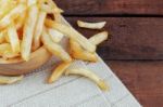 French Fries On Tablecloth Stock Photo