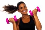 Happy Fitness Woman Lifting Dumbbells Stock Photo