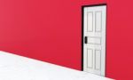 Closed Door With Red Wall Stock Photo