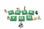 Miniature Worker Team Building Word Love You On White Background Stock Photo