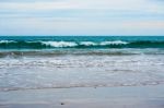 Sand Beach With Blue Ocean Stock Photo