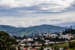 City With Mountains In The Background Stock Photo