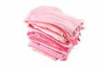 Pile Of Pink Shade Cloths On White Background Stock Photo