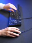 Woman Hand Typing On Keyboard Stock Photo