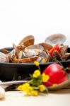 Fresh Clams On An Iron Skillet Stock Photo