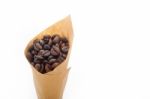 Espresso Coffee Beans On A Paper Cone Stock Photo