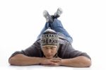 Laying Man Wearing Woollen Cap Stock Photo