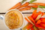 Fresh Hummus Dip With Raw Carrot And Celery Stock Photo