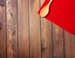 Round Rope Napkin Or Stand, Red Place Mat  And Spoon On A Wooden Stock Photo