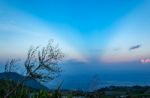 The Beauty Of The Sky When Light Hits The Clouds And Mountain Stock Photo