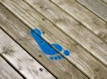 Red Painted Footprint On Southwold Pier Stock Photo