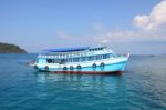 Tourist Boat Modified From Fishing On Wide Sea Stock Photo