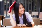 Asia Thai High School Student Uniform Beautiful Girl Read A Book Stock Photo